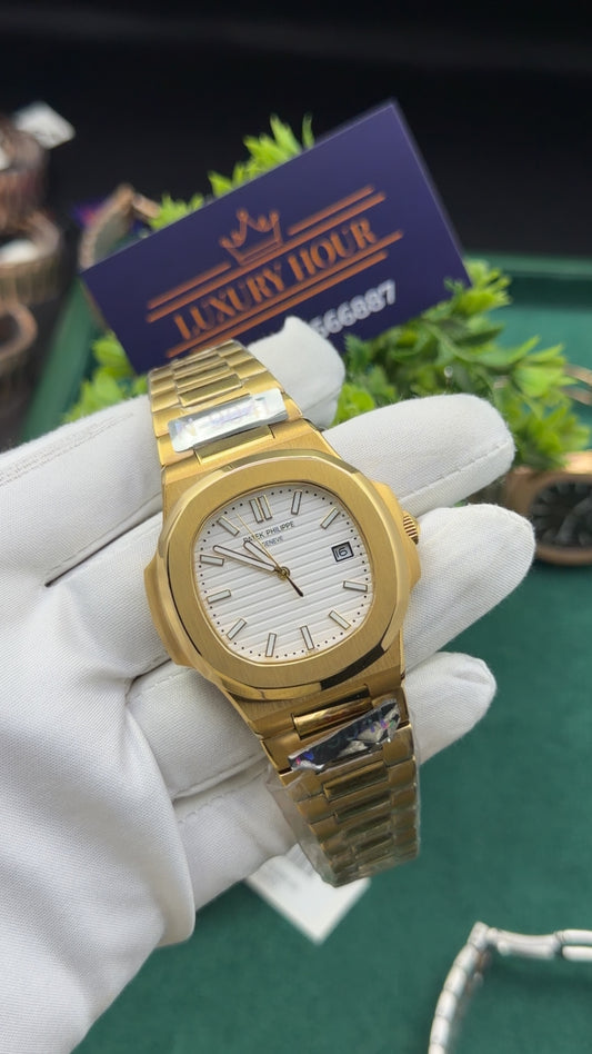 Yellow gold with white dial