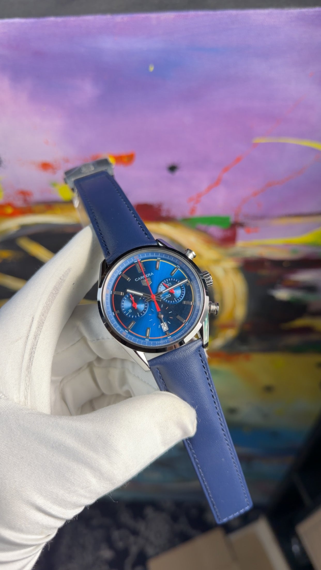 Silver with blue dial