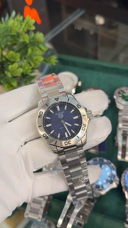 Silver with blue dial