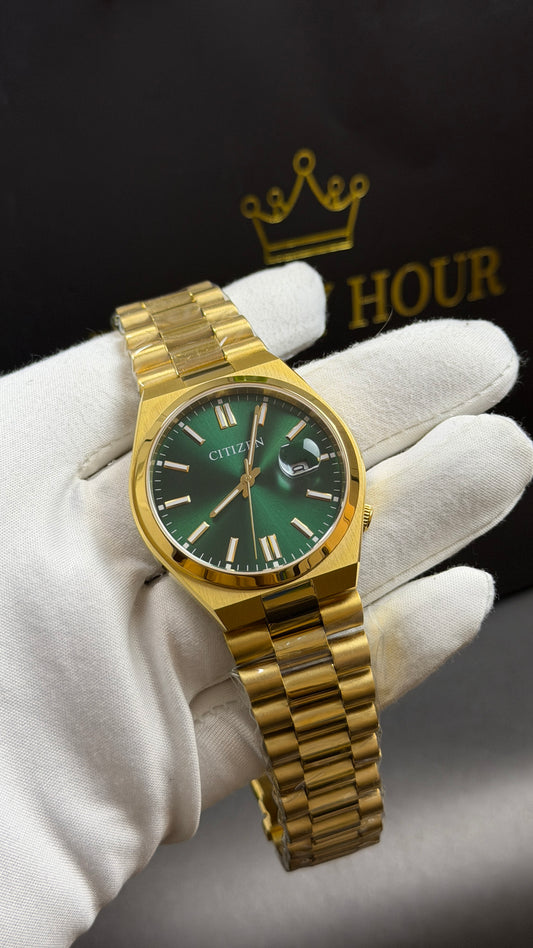 Yellow Gold with Green Dial.