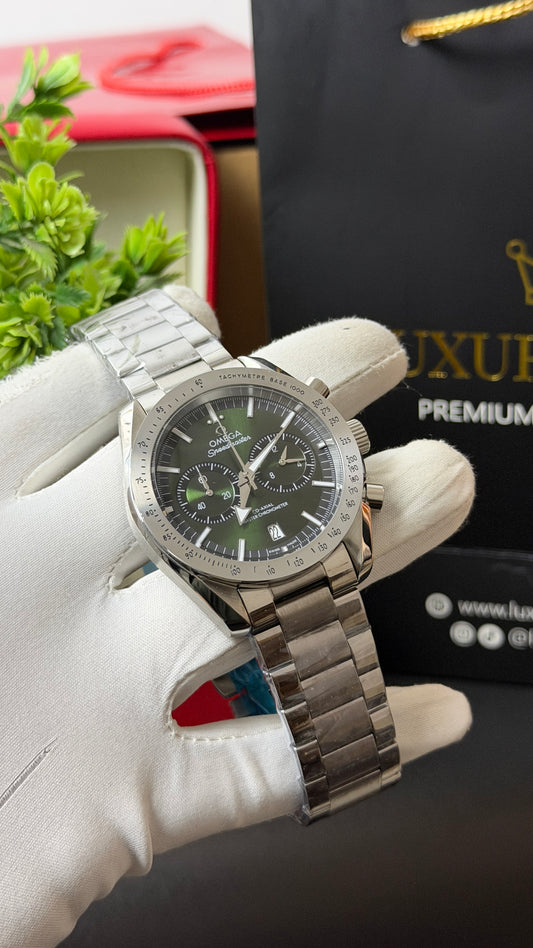 Silver with Green Dial.