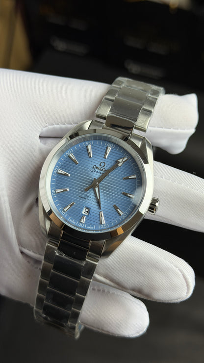 Silver with Sky Blue Dial.