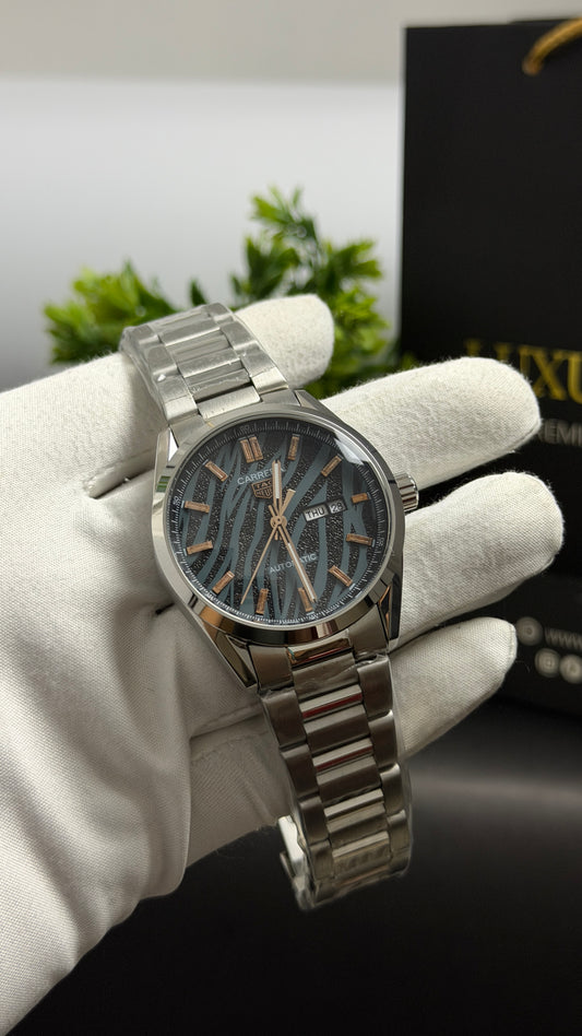Silver with Tiger Dial.