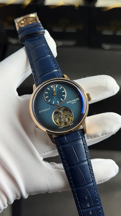 Rose Gold with Blue Dial.