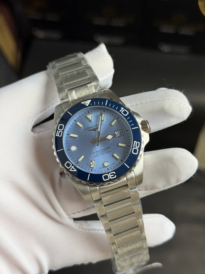 Silver with Sky Blue Dial.