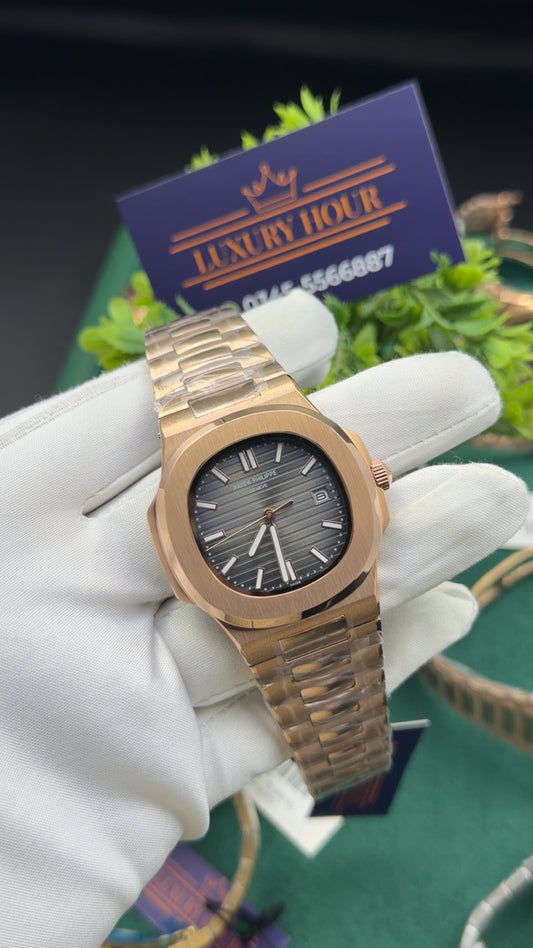 Rose gold  with grey dial