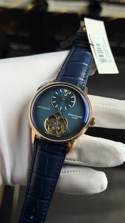 Rose Gold with Blue Dial.