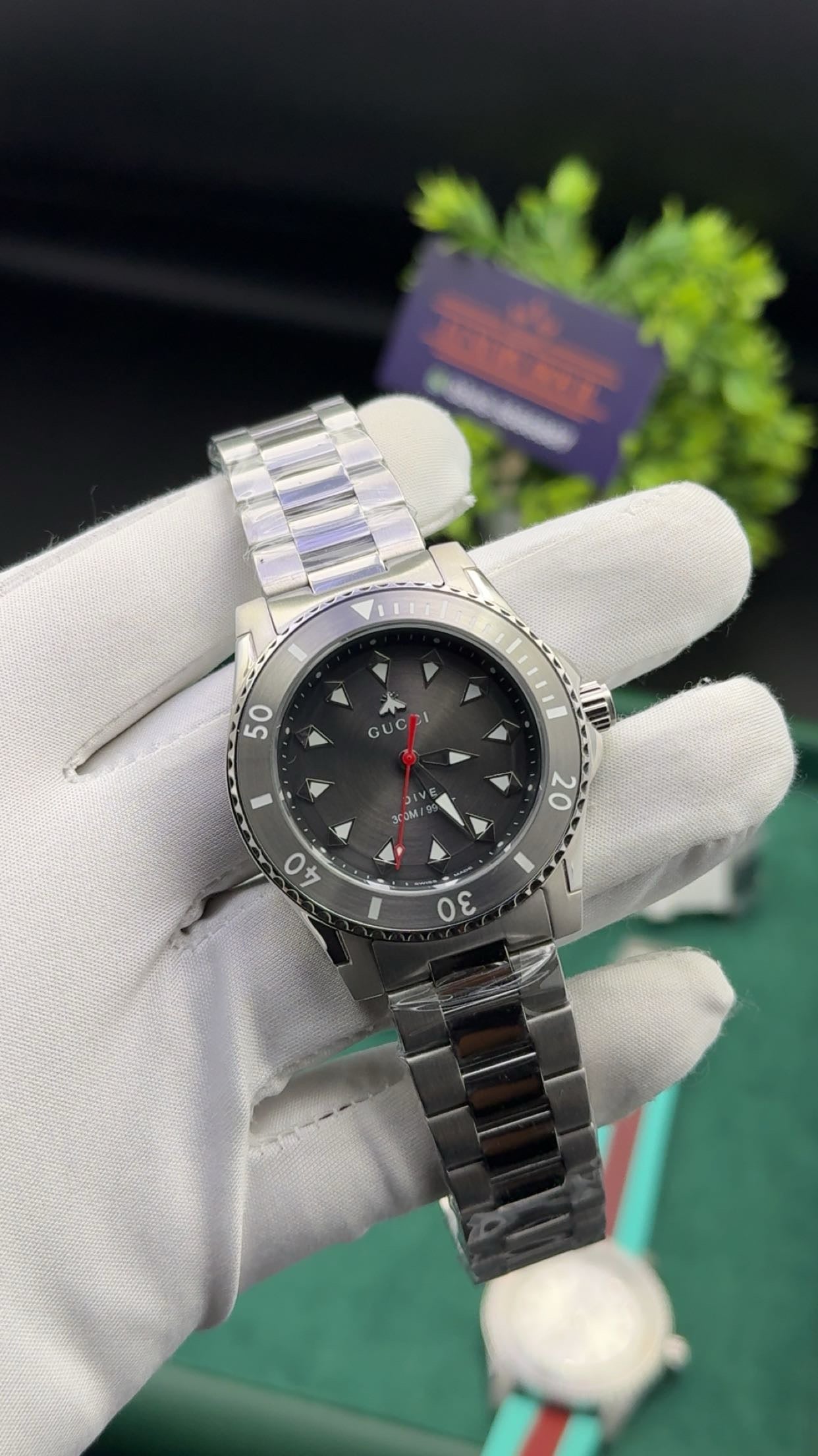 Silver with grey dial