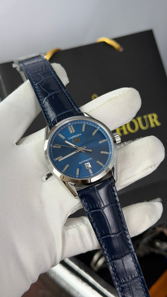 Silver with Aqua Dial.