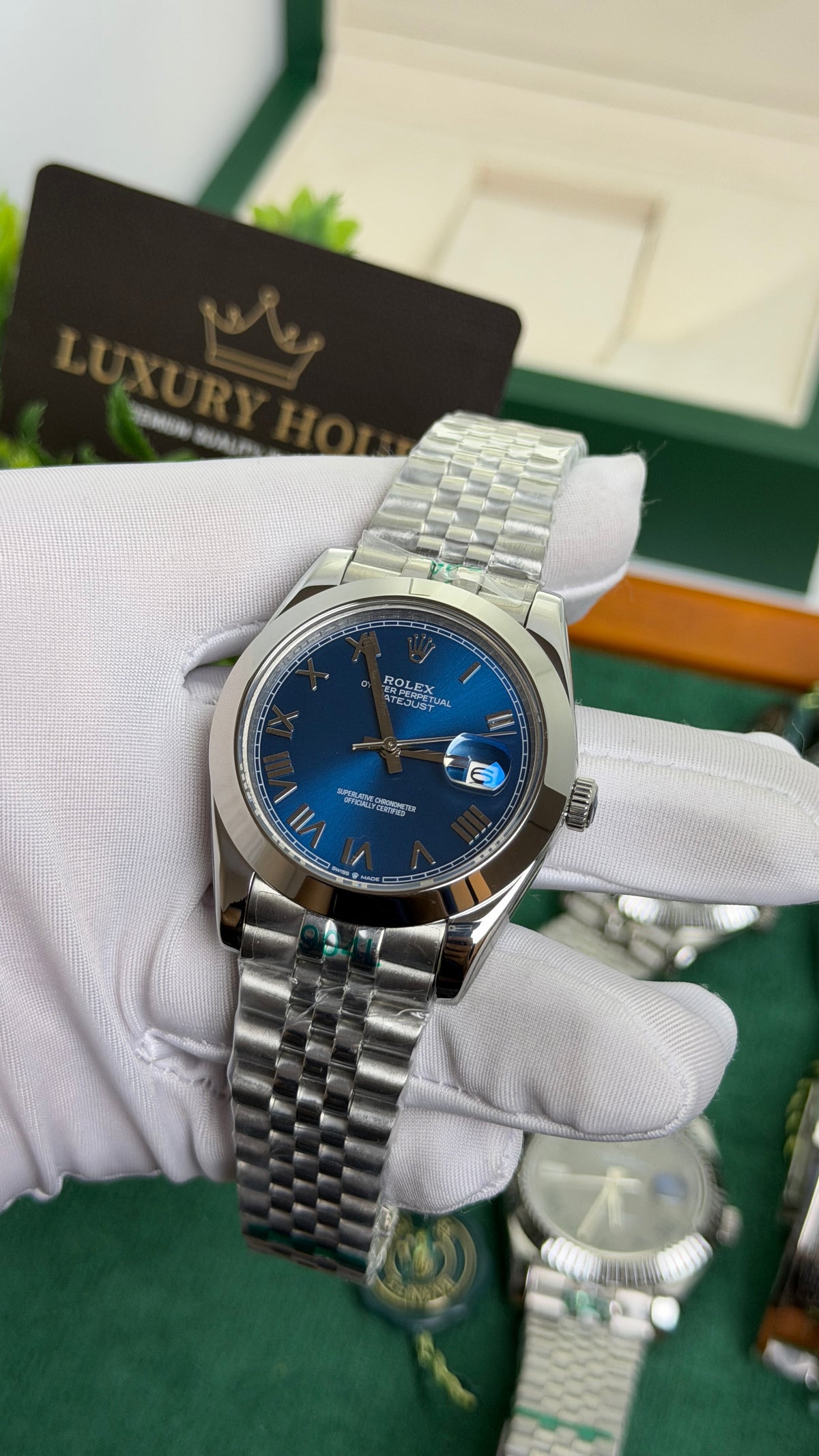 Silver with Blue Dial.