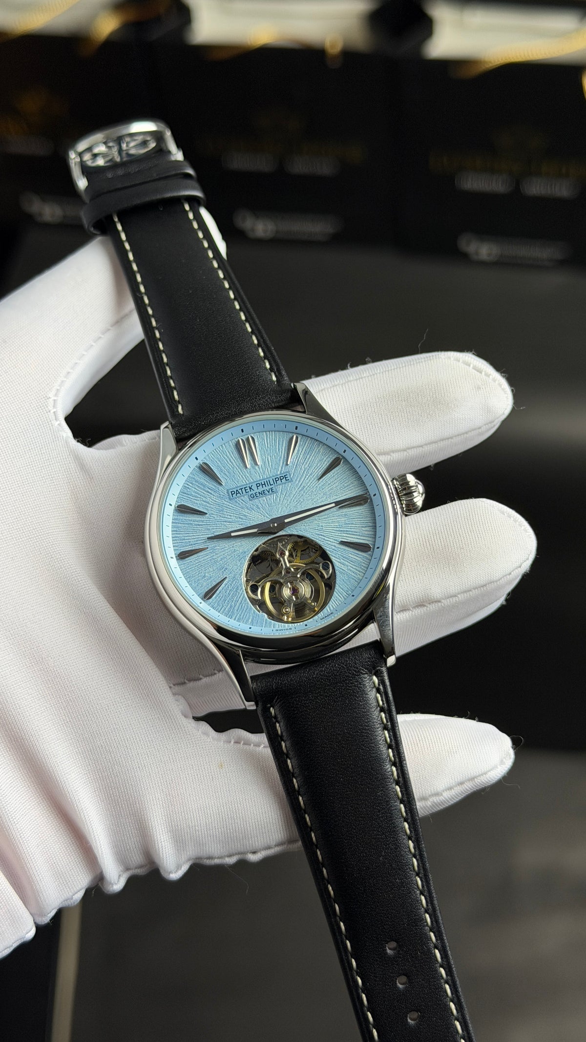 Silver with Sky Blue Dial.