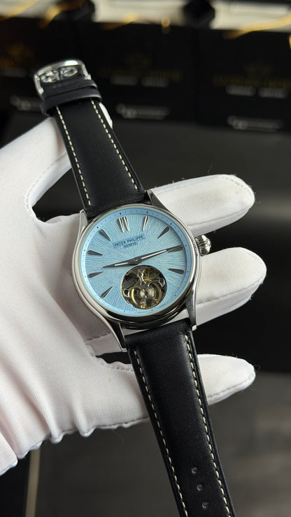 Silver with Sky Blue Dial.