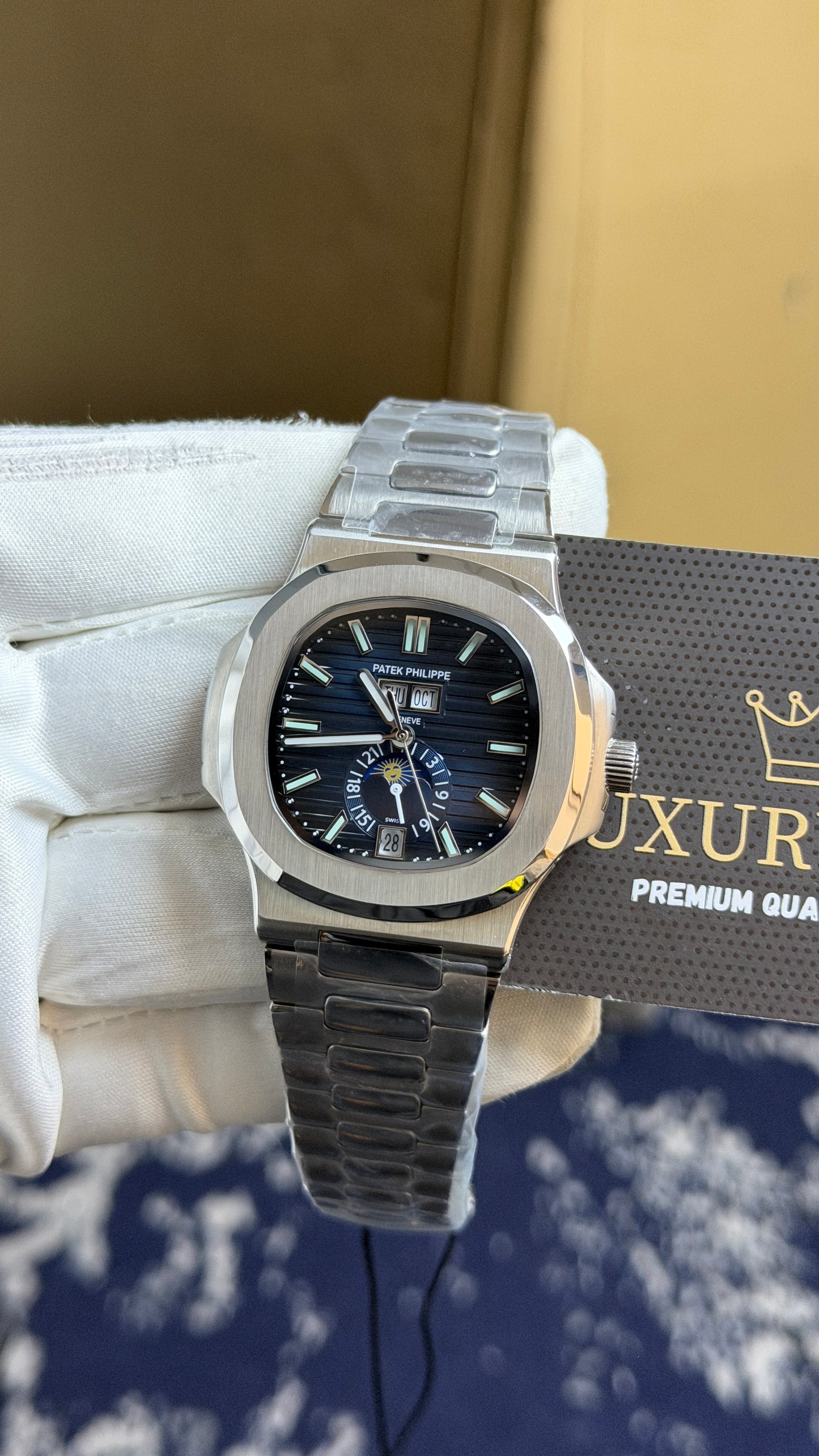 Silver with Aqua Dial.