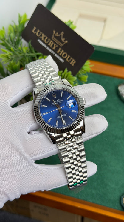 Silver with Blue Dial.