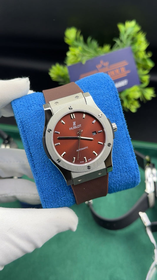 Silver with burgundy dial