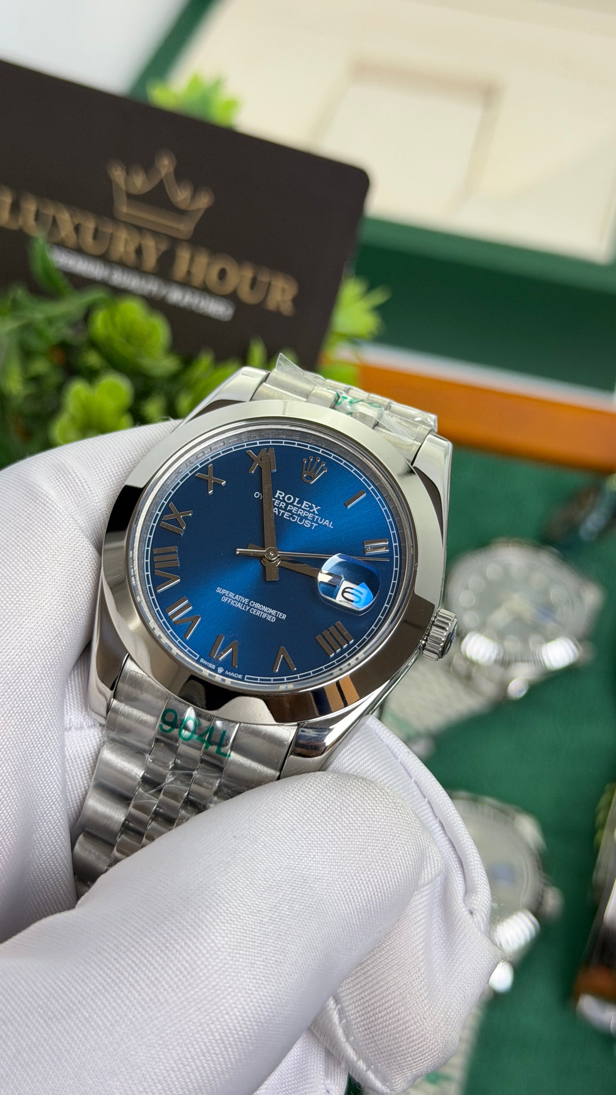 Silver with Blue Dial.