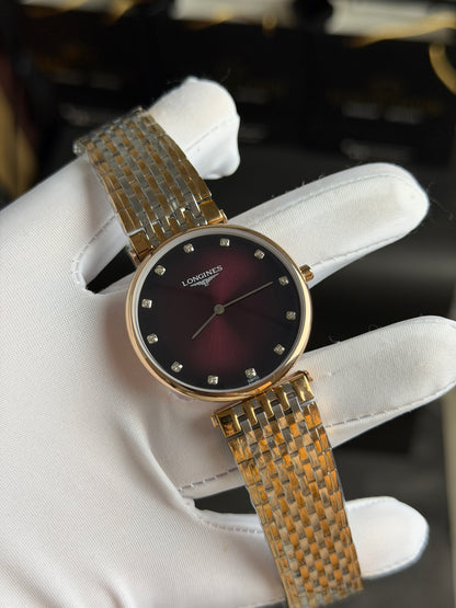 Rose Gold Two Tone with Maroon Dial.