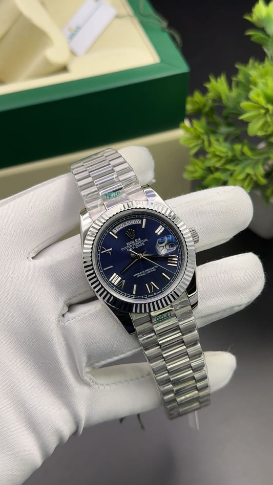 Silver with blue dial