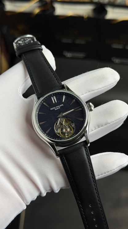 Silver with Blue Marble Dial.