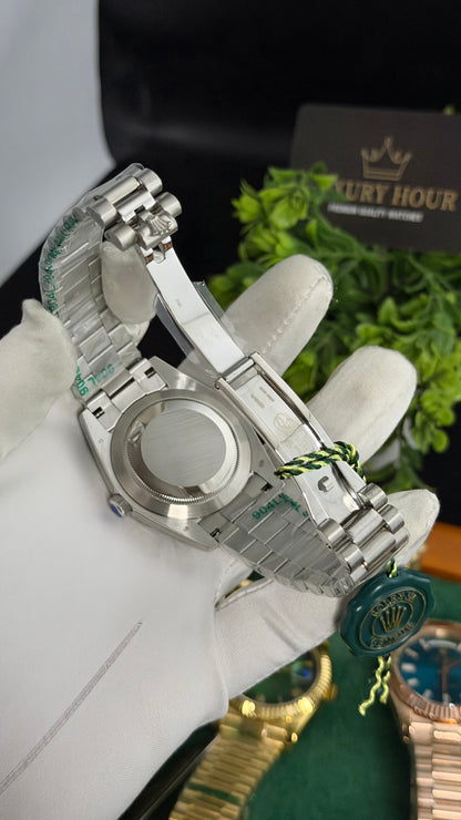 Silver with Green Dial