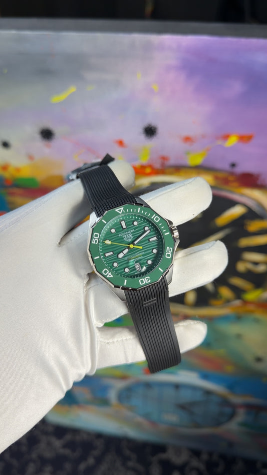 Silver with green dial