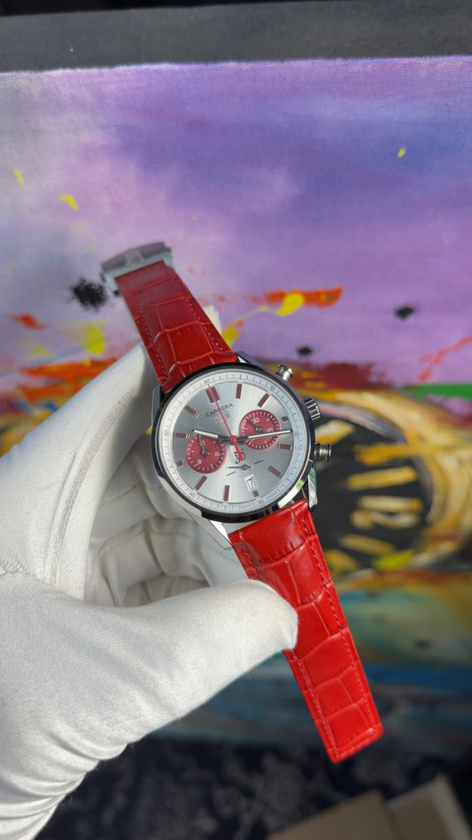 Silver with white dial and red strap