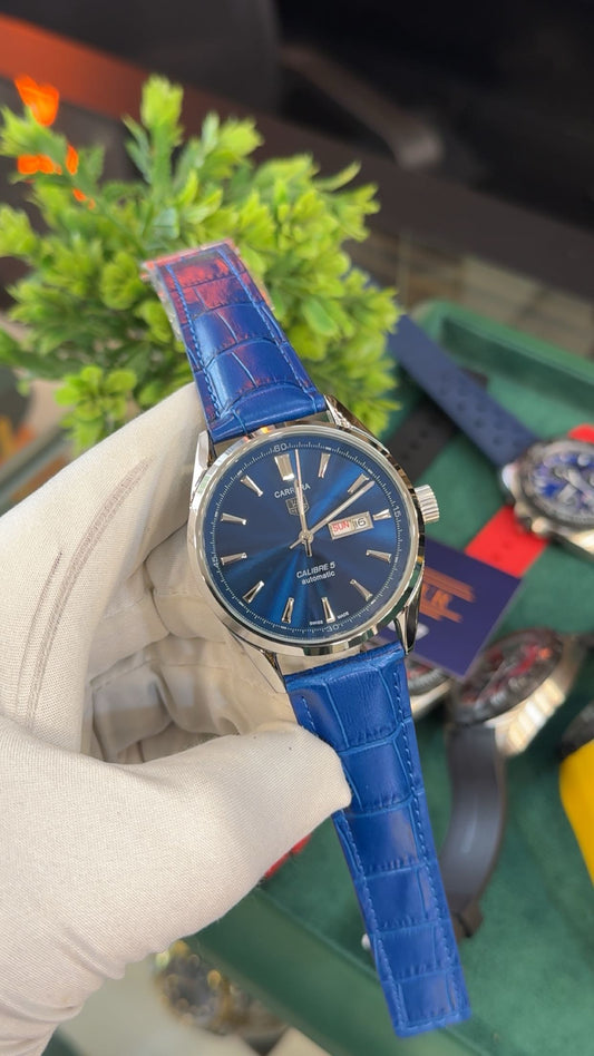 Silver with blue dial