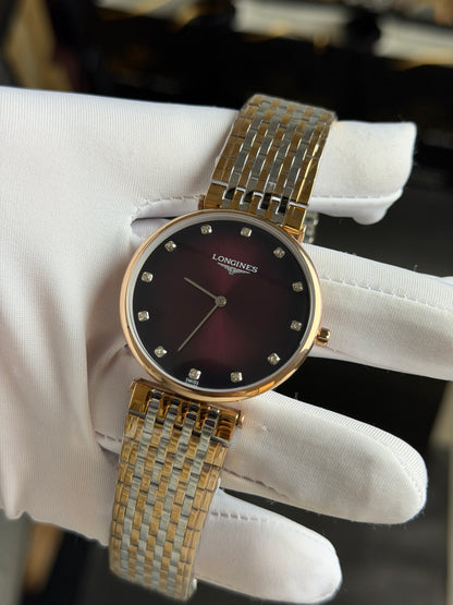 Rose Gold Two Tone with Maroon Dial.