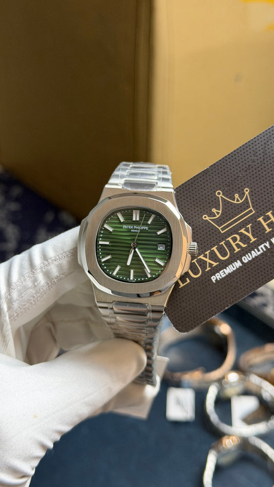 Silver with Green Dial.