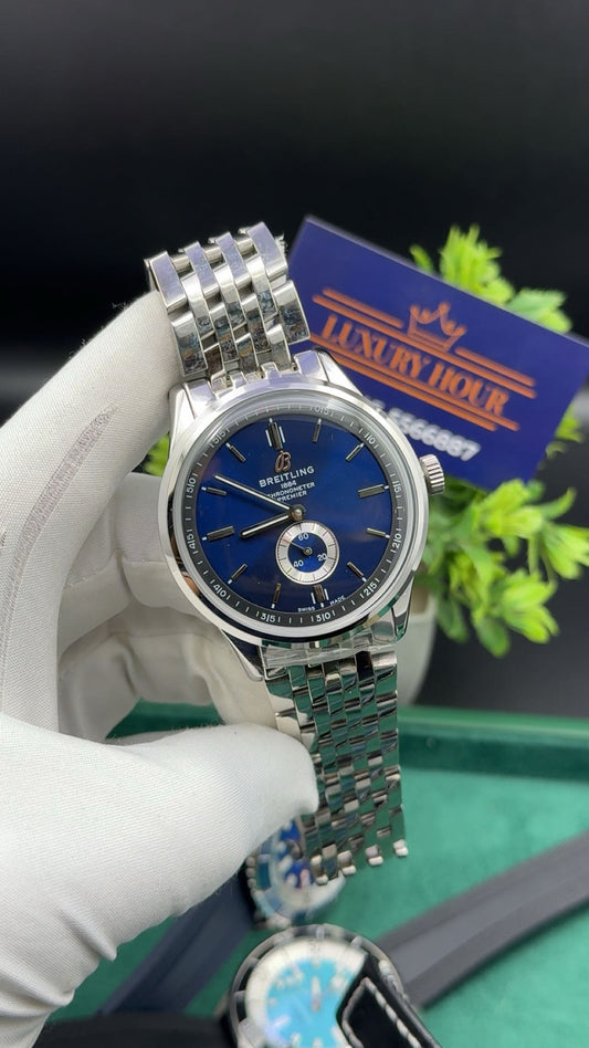Silver with blue dial