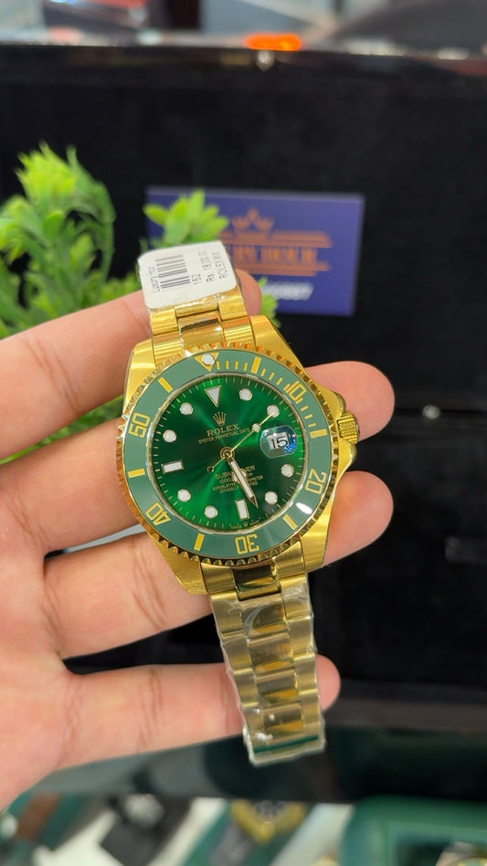 Yellow gold with green dial