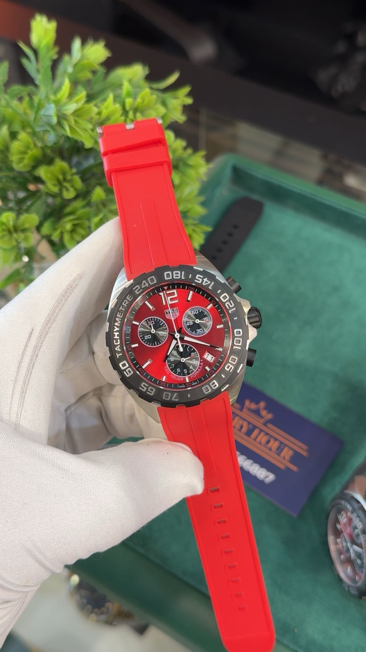 Silver with red dial