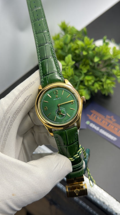 Yellow gold classic beauty with green dial.