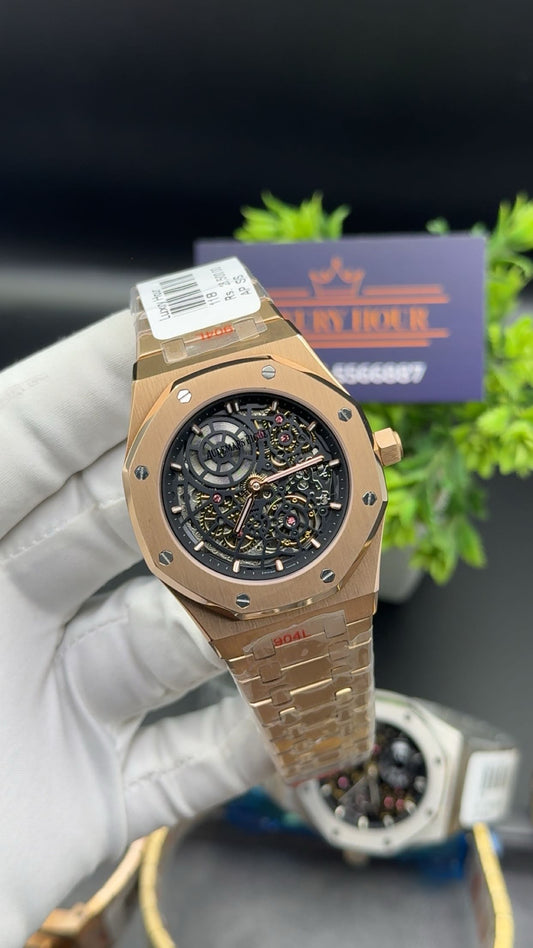 Rose gold with black dial.