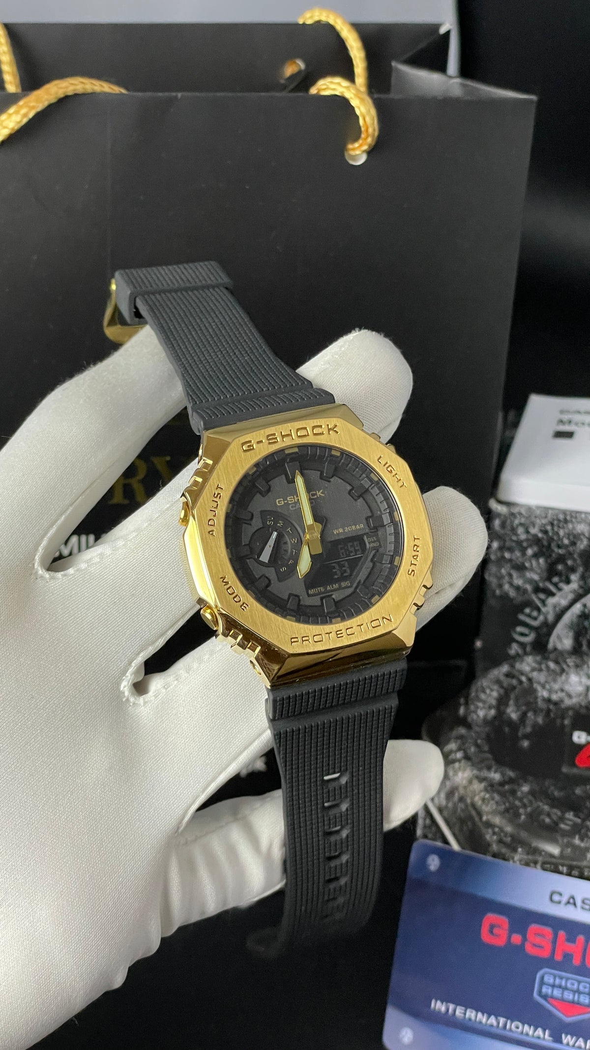 Yellow Gold with Black Dial.