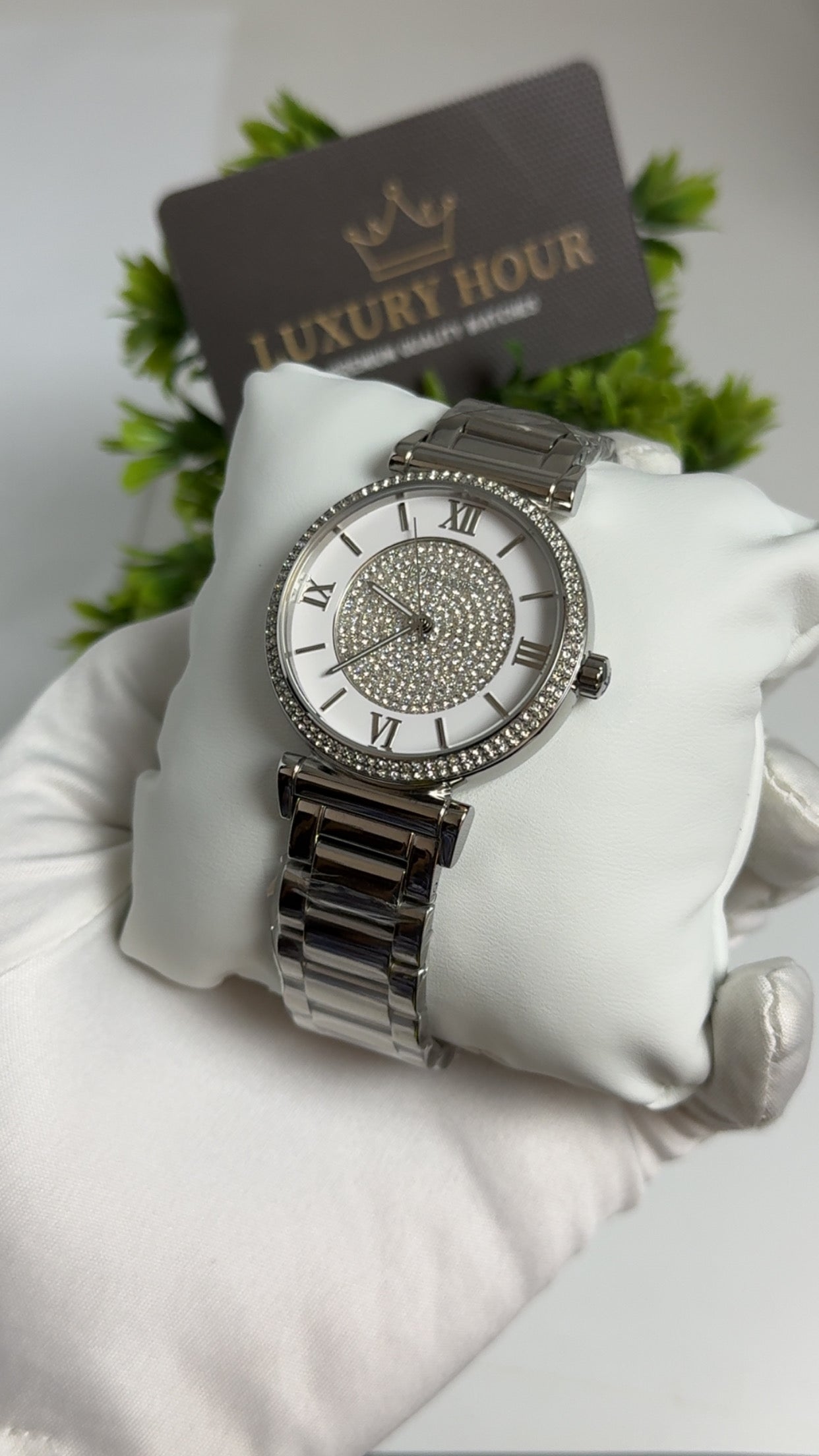 Silver with Diamond Dial.