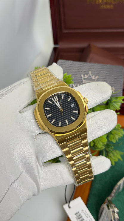 Yellow Gold with Black Dial.