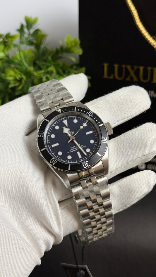 Silver with Blue Dial.