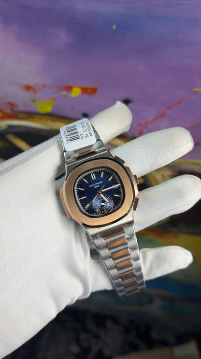 Rose gold two tone with blue dial