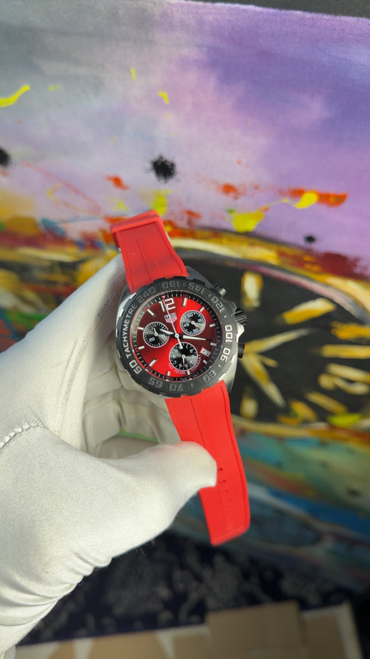 Silver with red dial