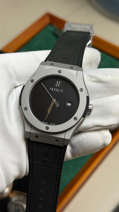Silver with Black Dial.