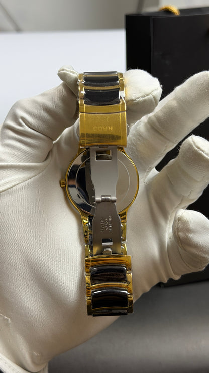 Yellow Gold Two Tone with Black Dial.