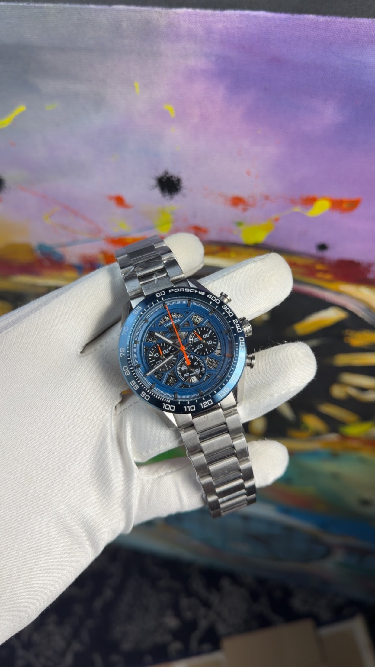 Silver with blue dial