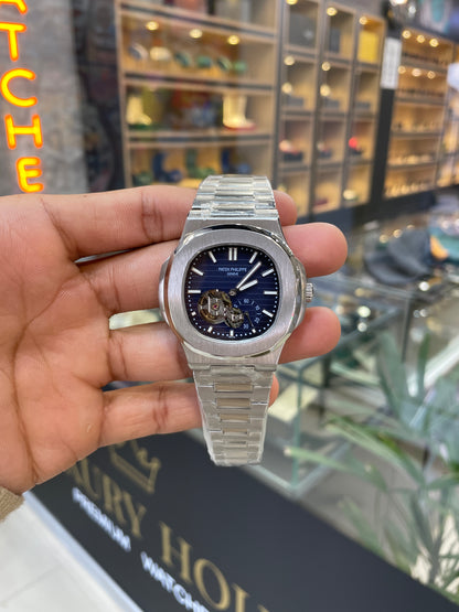 Silver with blue dial