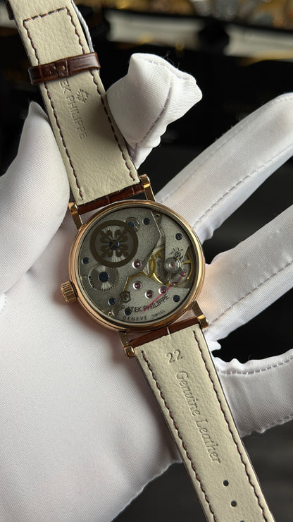 Rose Gold with White Dial.