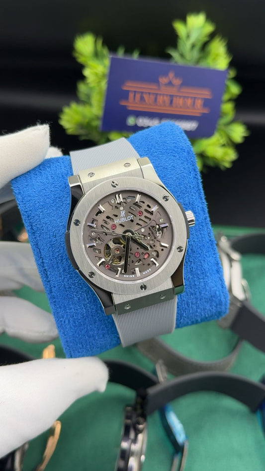 Silver with grey dial
