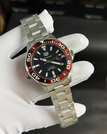 Silver with Black Dial.
