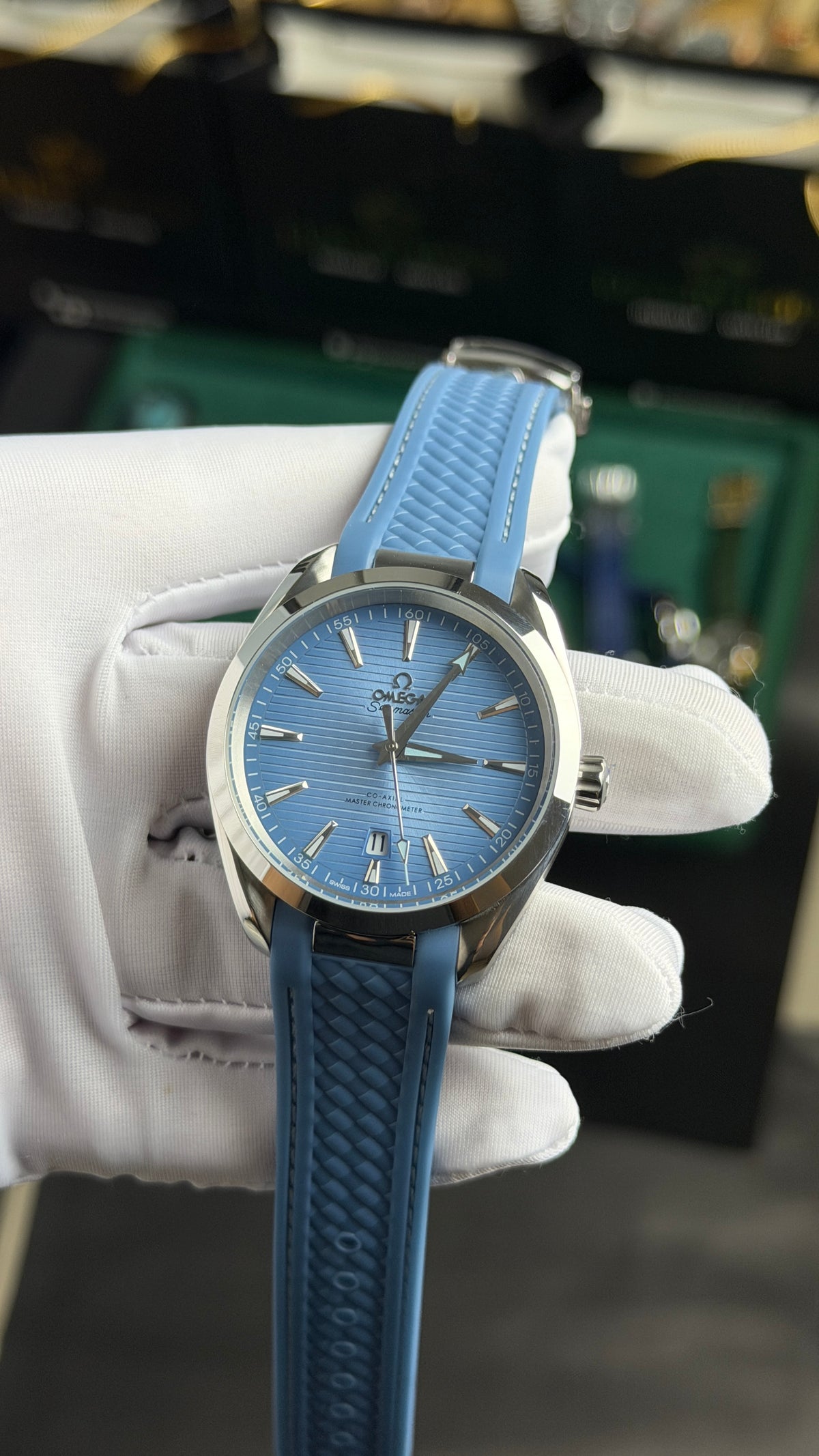 Silver with Sky Blue Dial.