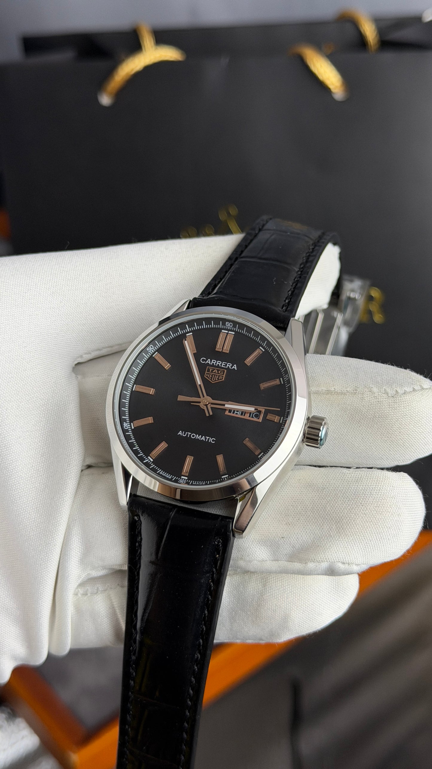 Silver with Black Dial.