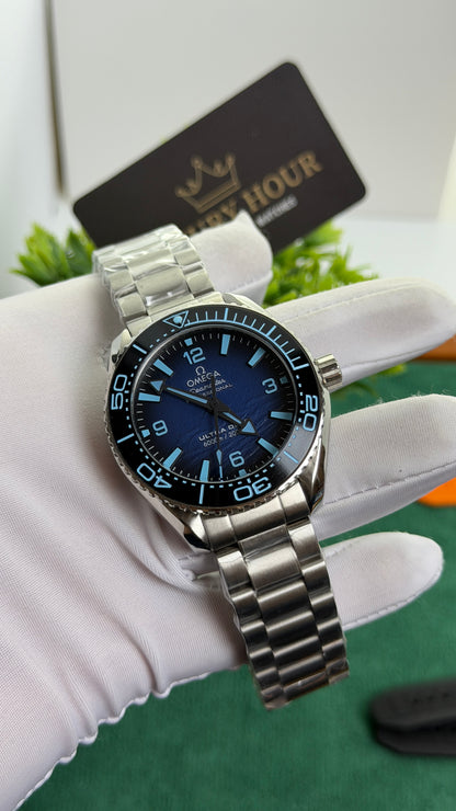 Silver with Blue Dial.